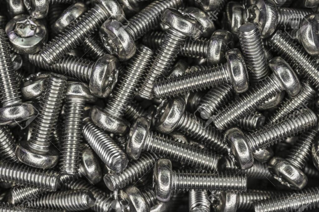 139576010 stainless steel screws as background pattern